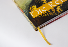 Hardcover book with printed cover and golden yellow bookmark