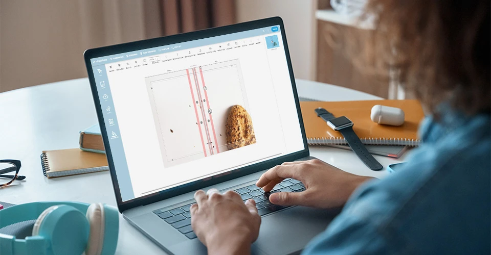 Customer at desk configuring screw post binding via online designer