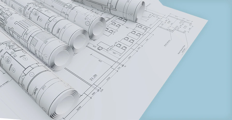Mehrere CAD-Plots aufgerollt auf blauem Hintergrund