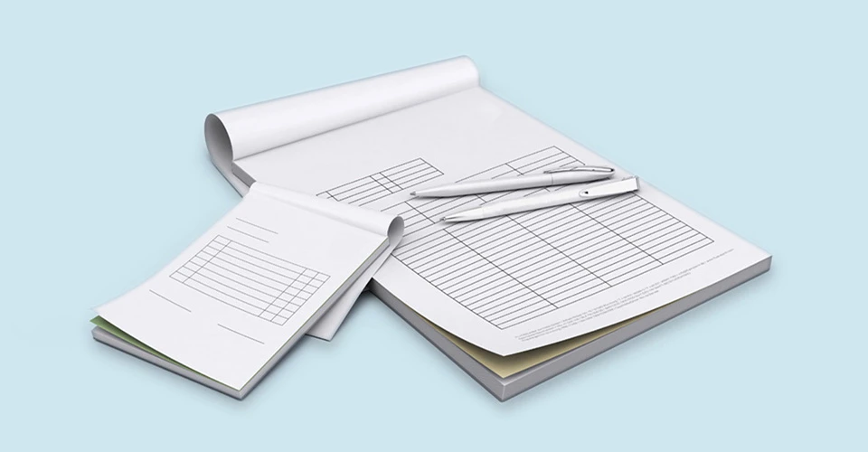 Example of a carbonless block with pens