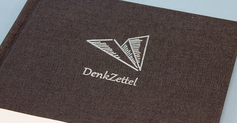 Embossing on linen cover with custom embossing stamp