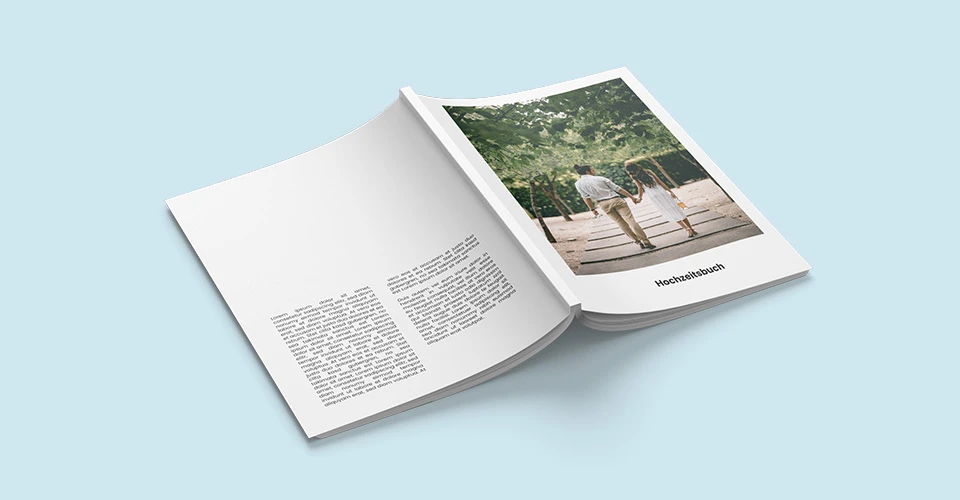 Softcover photo book in DIN A4 format with spine facing up